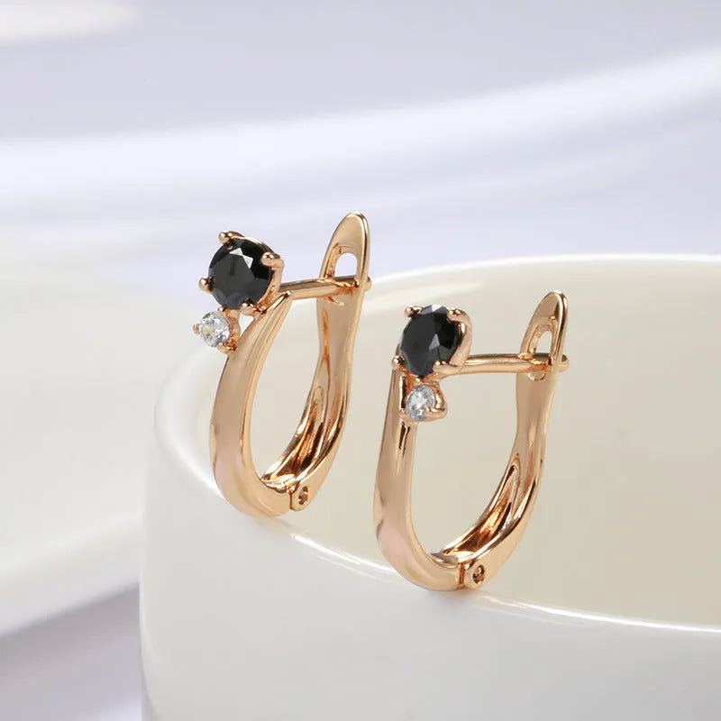 Gold geometric drop earrings with black agate stone inlay on copper setting, retro design