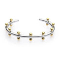 Stainless steel adjustable bracelet with C-shaped links and rivet-shaped bean beads in gold, steel, or steel gold finish