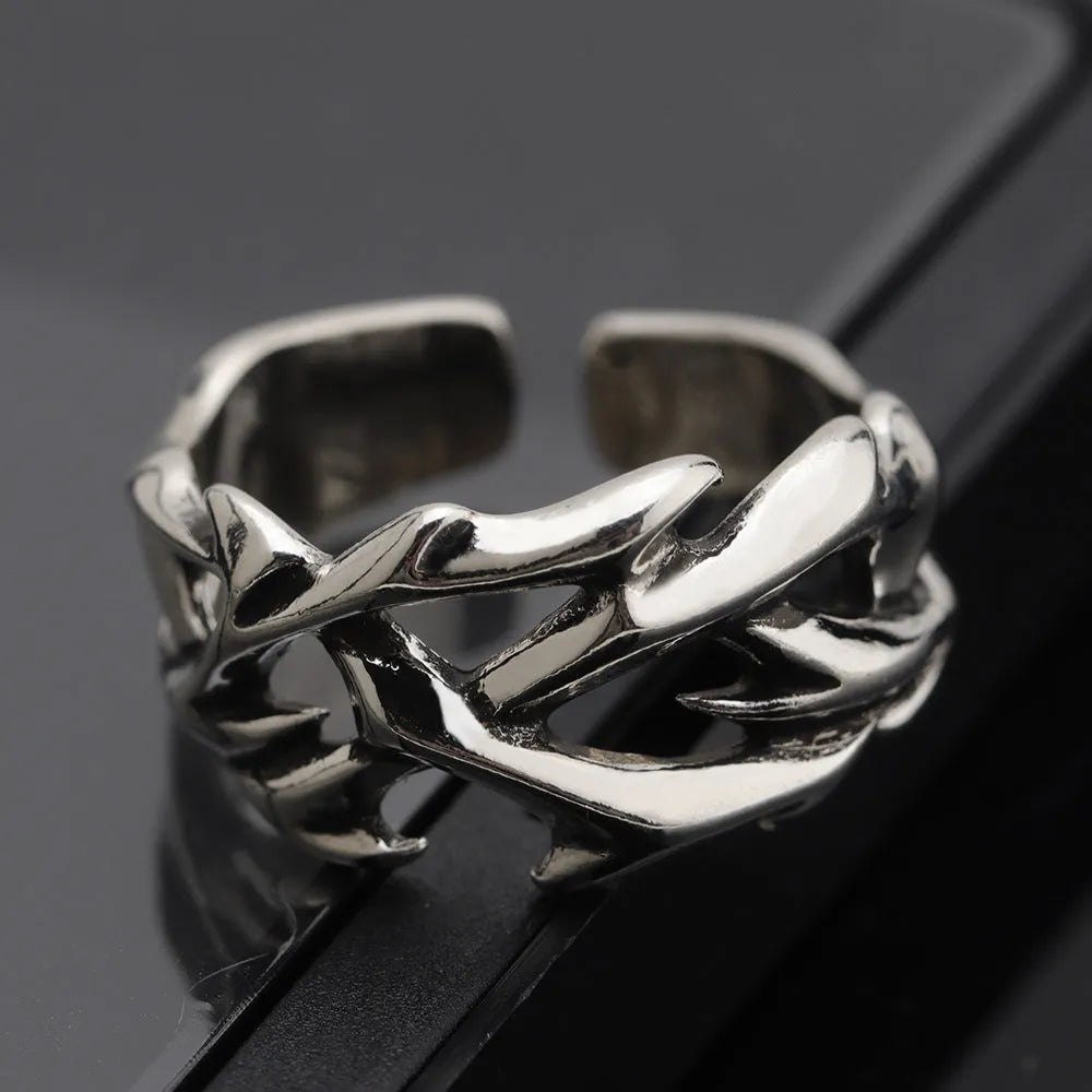 Thorn Flower Ring in J2150 thorns colour with geometric design and adjustable opening, made from copper for unisex fashion.