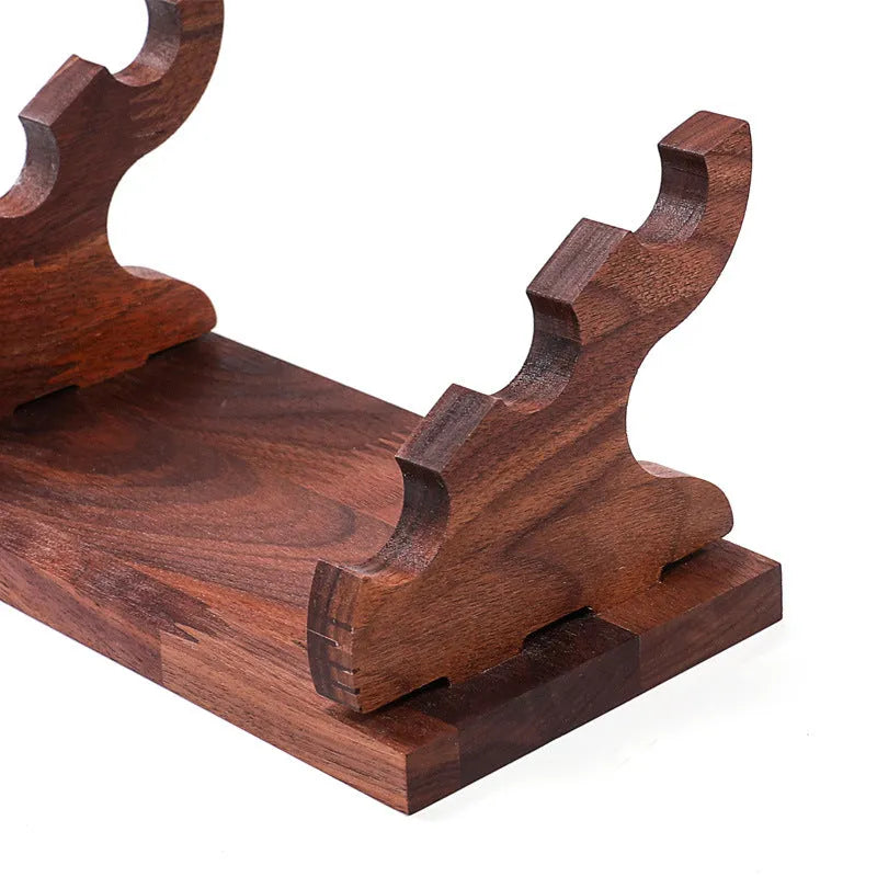 Solid wood trapezoid ring display stand with multiple fabric-lined layers in walnut finish
