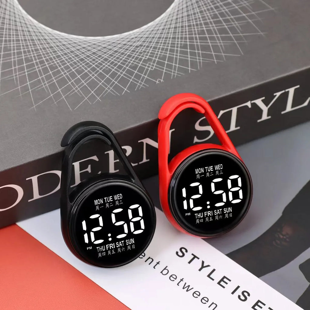 LED luminous electronic watch in black with plastic strap and digital display, showing time with waterproof rating