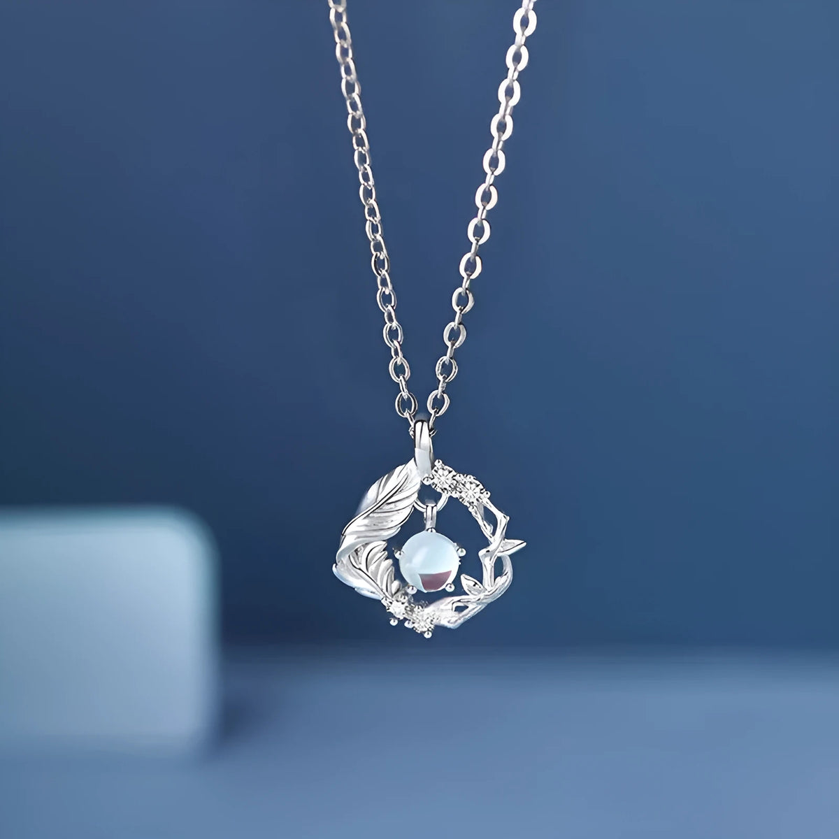 Women's adjustable tree and bird pendant necklace with geometric alloy design in blue eucalyptus colour