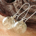 Transparent glass ball earrings with crystal dandelion pattern on French hooks, 16mm diameter