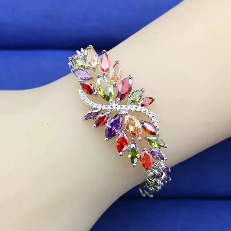 Gold electroplated copper bracelet with micro inlaid colour zircons and ice flowers pattern