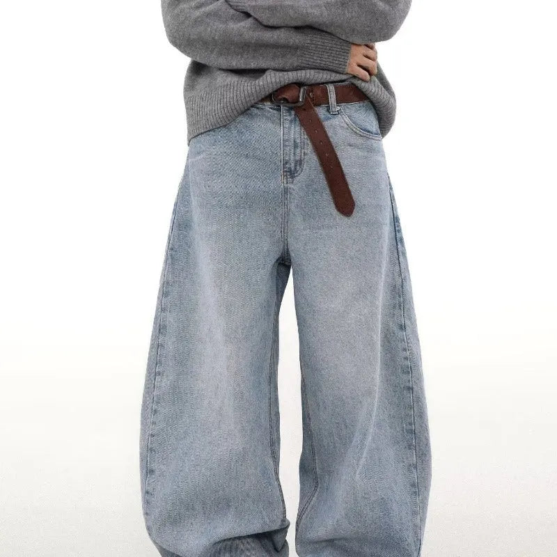 Men's blue straight leg jeans with a distressed retro wash and a mid-rise waist.