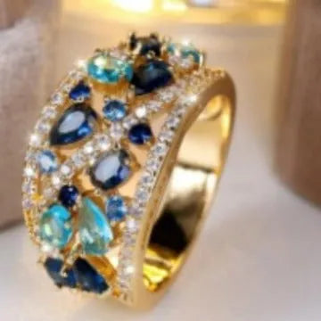Women's round hollow fashion ring in copper with gold or platinum plating options