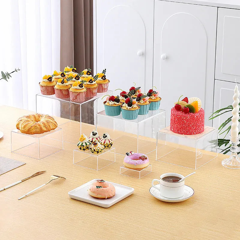 White modular cube dessert display stand with 6 pieces arranged in tiered configuration
