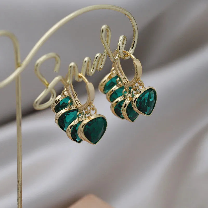 Green glass heart pendant earrings with Korean style design and ear clip fitting