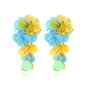 Handmade string bead flower earrings with exaggerated floral designs in rose and purple colours, measuring 5-7cm