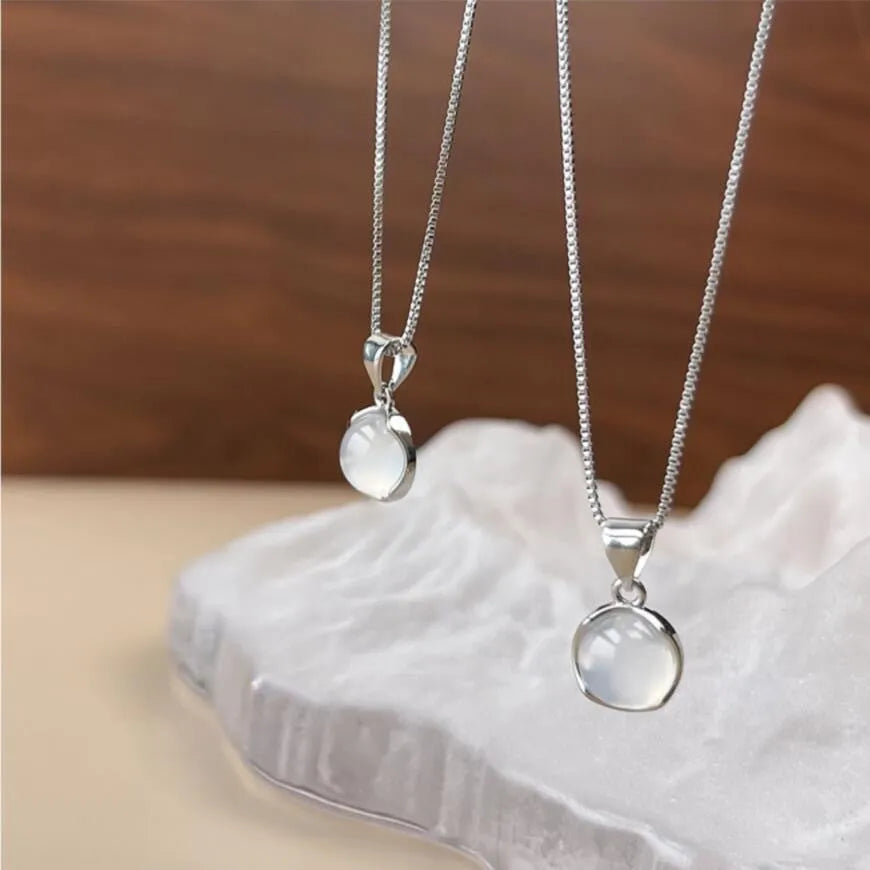 Women's adjustable oval pendant necklace with artificial crystal star design on a box chain in X7 6 Moon Light colour