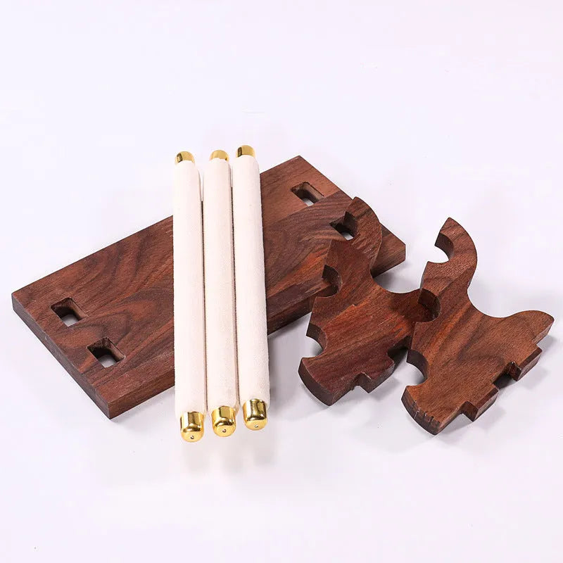 Solid wood trapezoid ring display stand with multiple fabric-lined layers in walnut finish