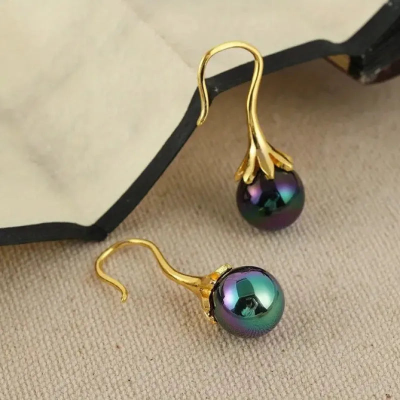 Retro fashion women's earrings with electroplated imitation gold finish on alloy, showing post-and-clutch backing.