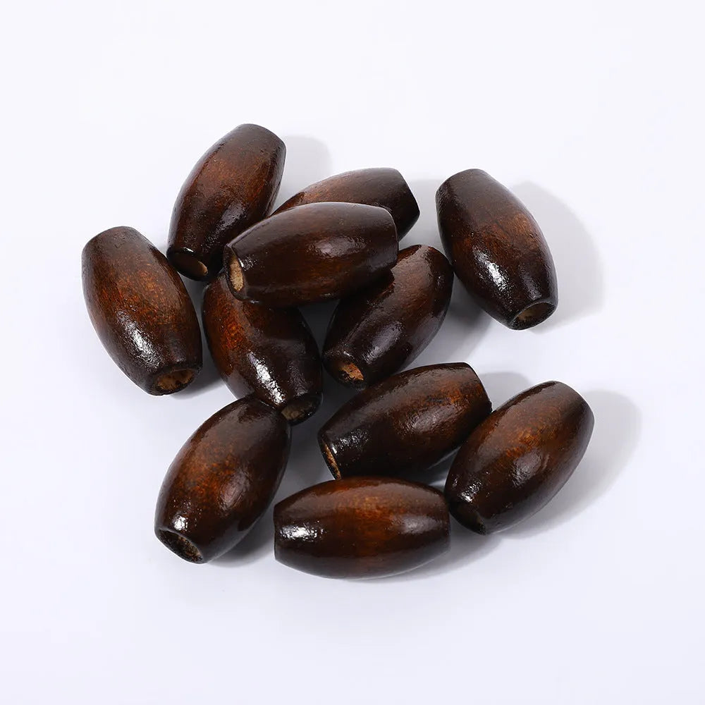 Oval wooden beads in dark coffee colour with M-shaped raised profile