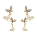 Women's gold-coloured copper butterfly earrings with four butterfly drop design