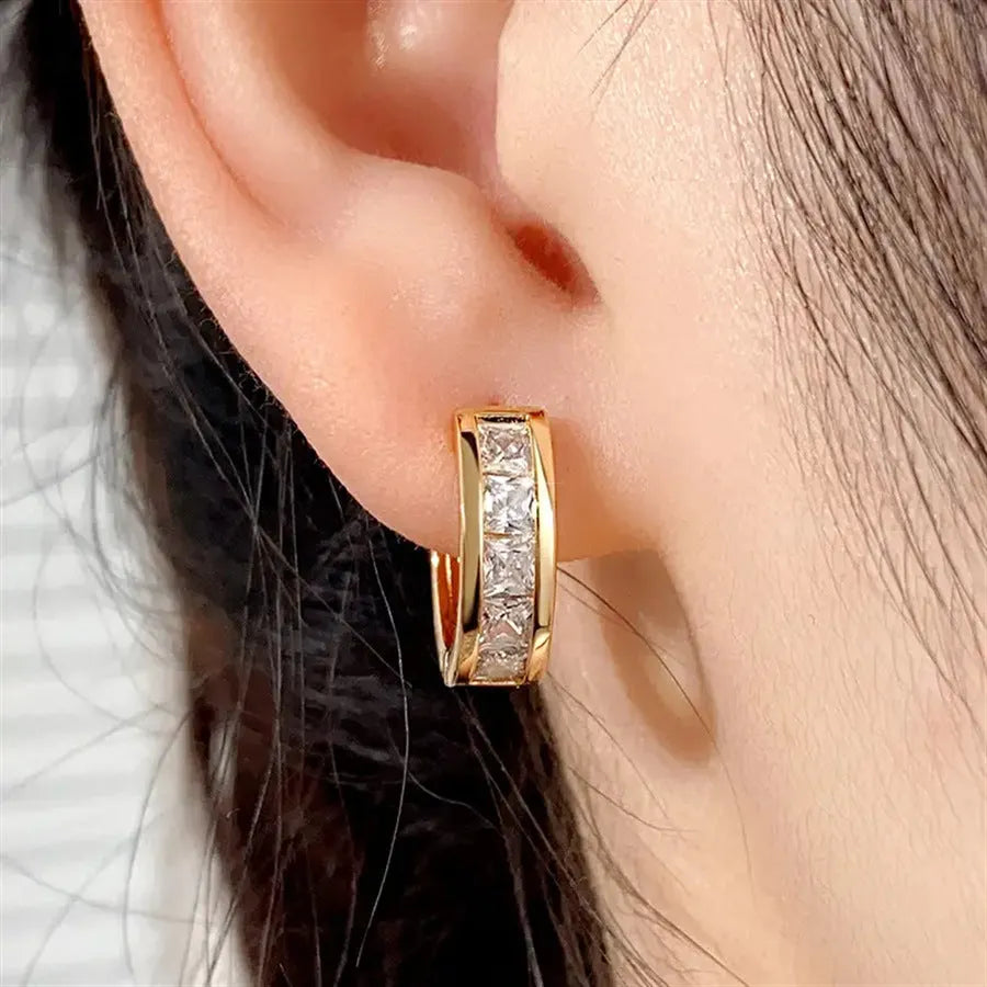 Geometric quadrilateral copper earrings for women in gold or silver plating, showing precise angles and lightweight design