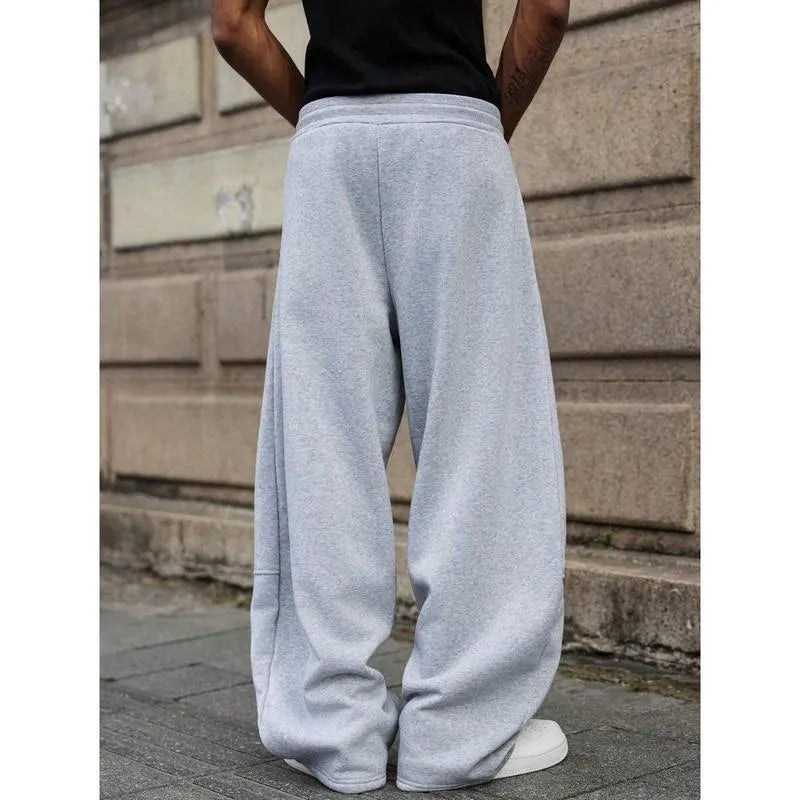 Men's straight high waist casual trousers in dark grey, showcasing cropped length and straight-leg silhouette.