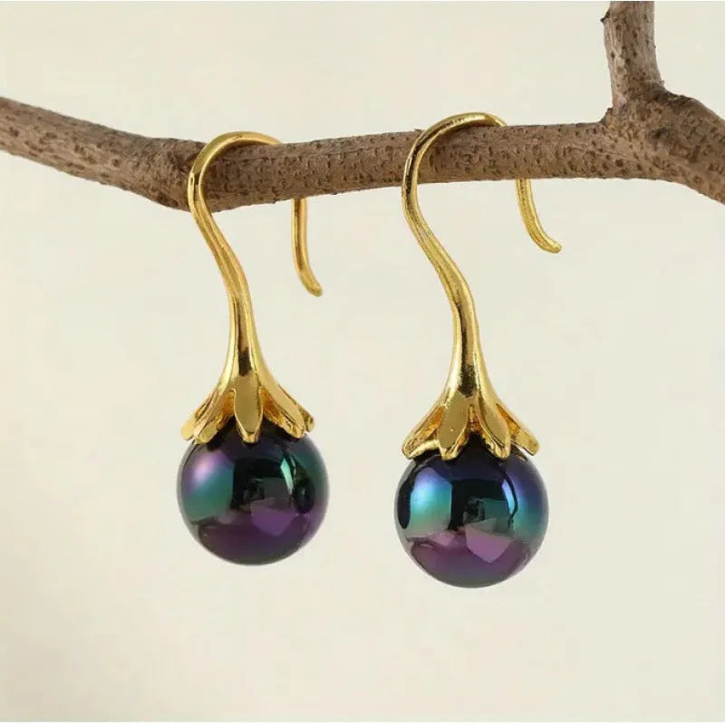 Retro fashion women's earrings with electroplated imitation gold finish on alloy, showing post-and-clutch backing.