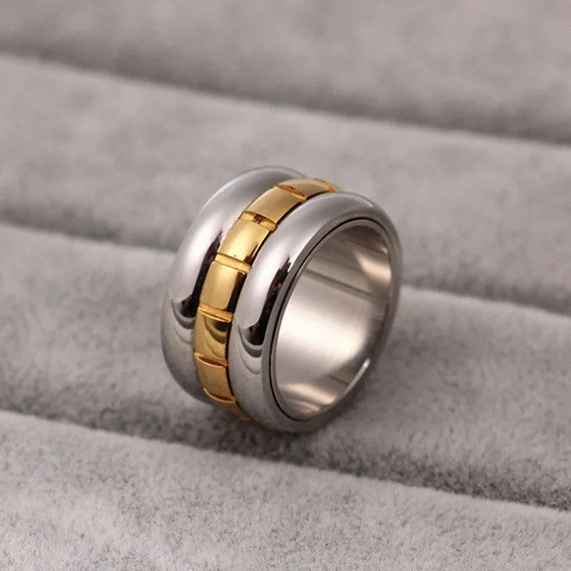 Gold titanium steel ring with rotating ultra-wide knuckle section shown in multiple size options