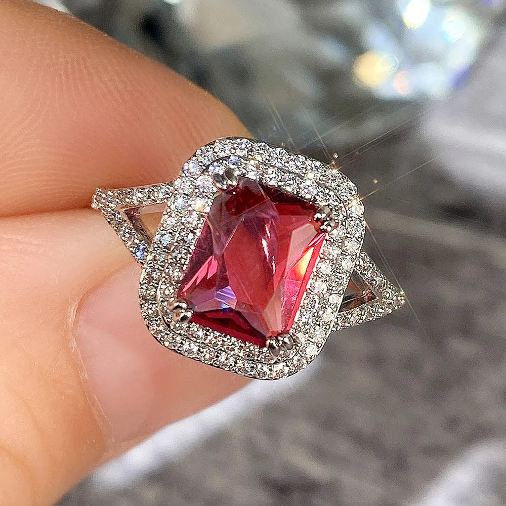 Copper rhinestone square princess ring in F827 red colour, showing geometric design and UK sizes 6-10.