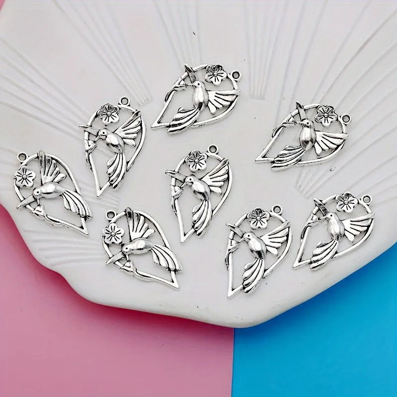 Alloy magpie pendant with electroplated finish measuring 2.5cm height for DIY jewellery making