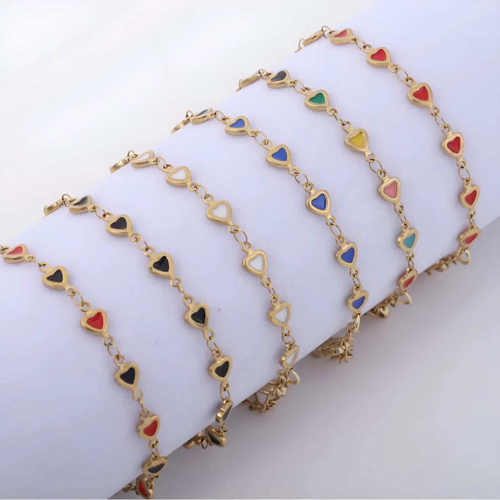 Unisex stainless steel heart bracelet with 18K gold vacuum plating in multiple colours on adjustable chain.