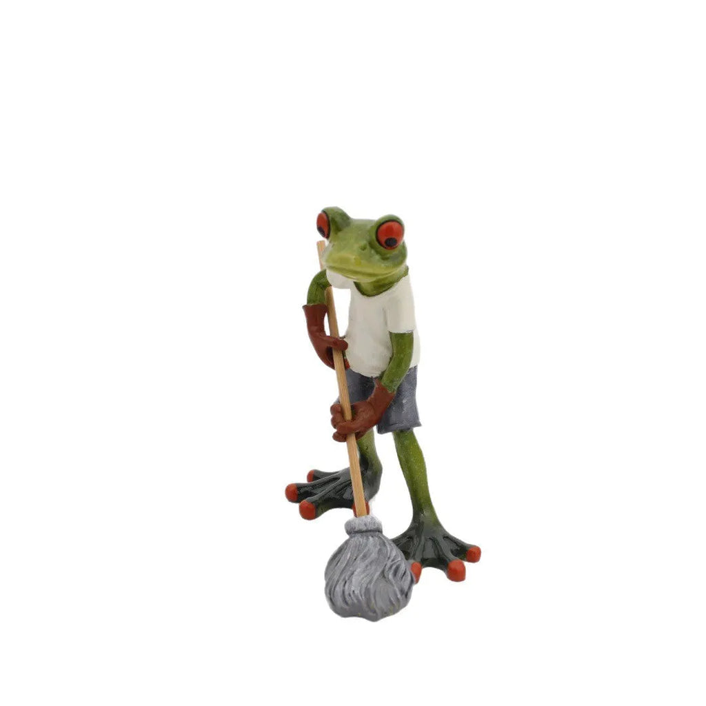 Pastoral style resin frog decoration on wooden shelf, showing hand-finished details and natural colour tones