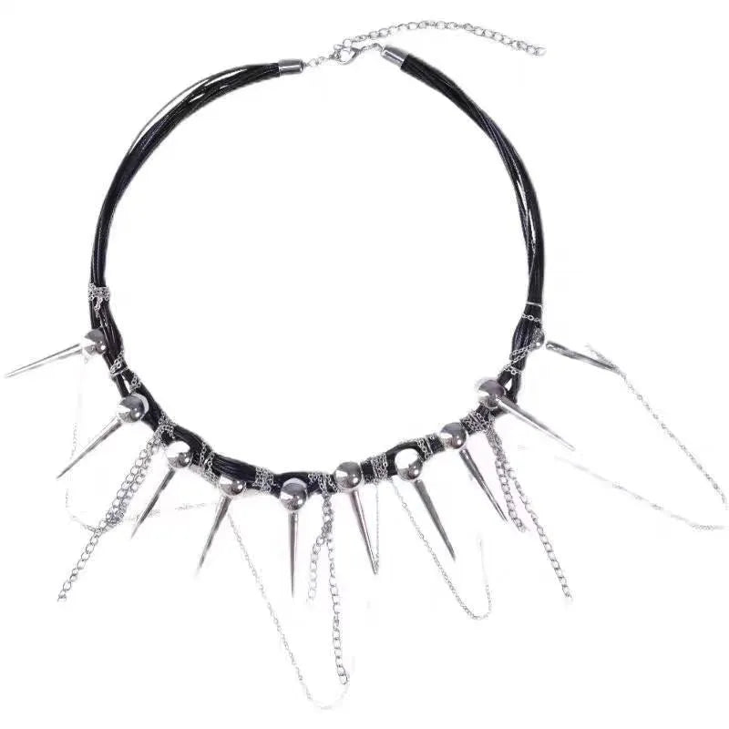 Leather necklace with winding tassel, round beads, and metallic rivet details in a picture colour.