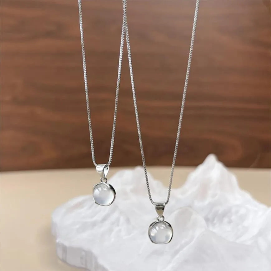 Women's adjustable oval pendant necklace with artificial crystal star design on a box chain in X7 6 Moon Light colour