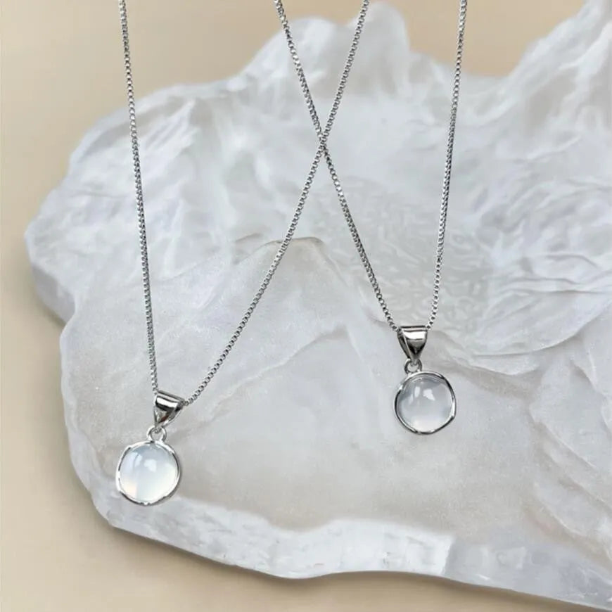 Women's adjustable oval pendant necklace with artificial crystal star design on a box chain in X7 6 Moon Light colour