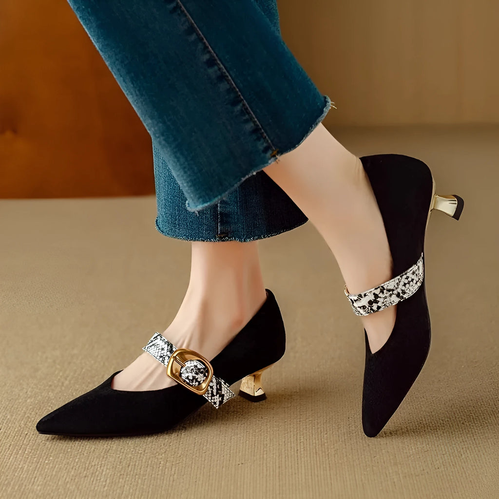 Women's black stiletto high heels with French pointed toe and decorative buckle fastening