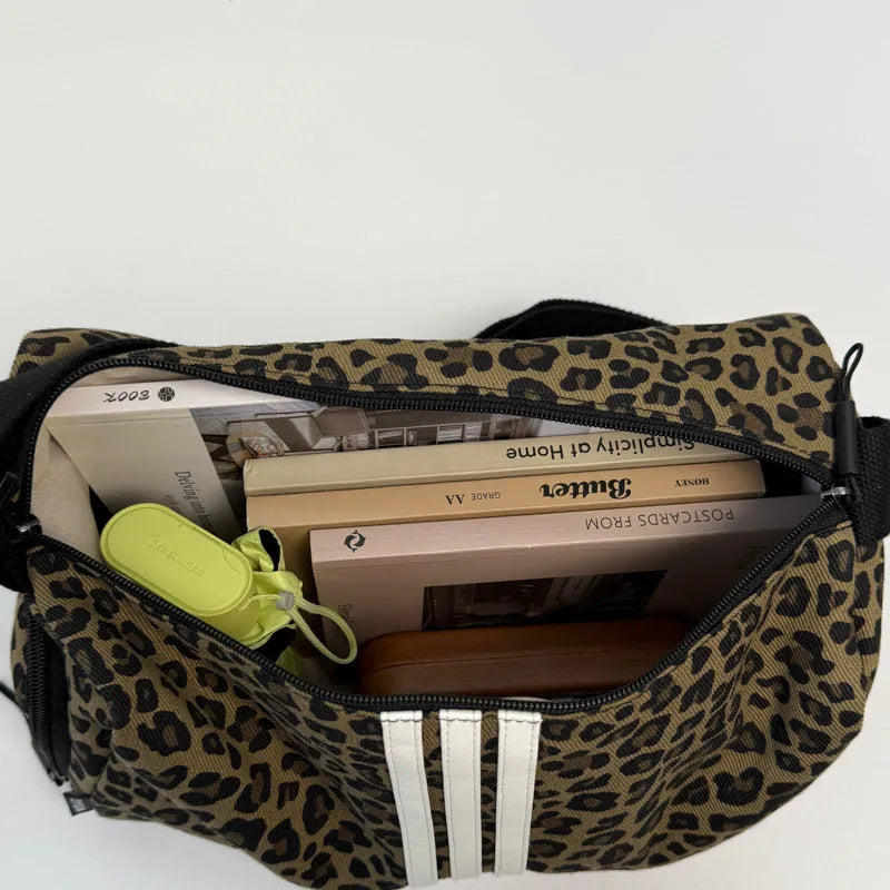 Unisex leopard print messenger bag with striped pattern, crossbody shoulder design