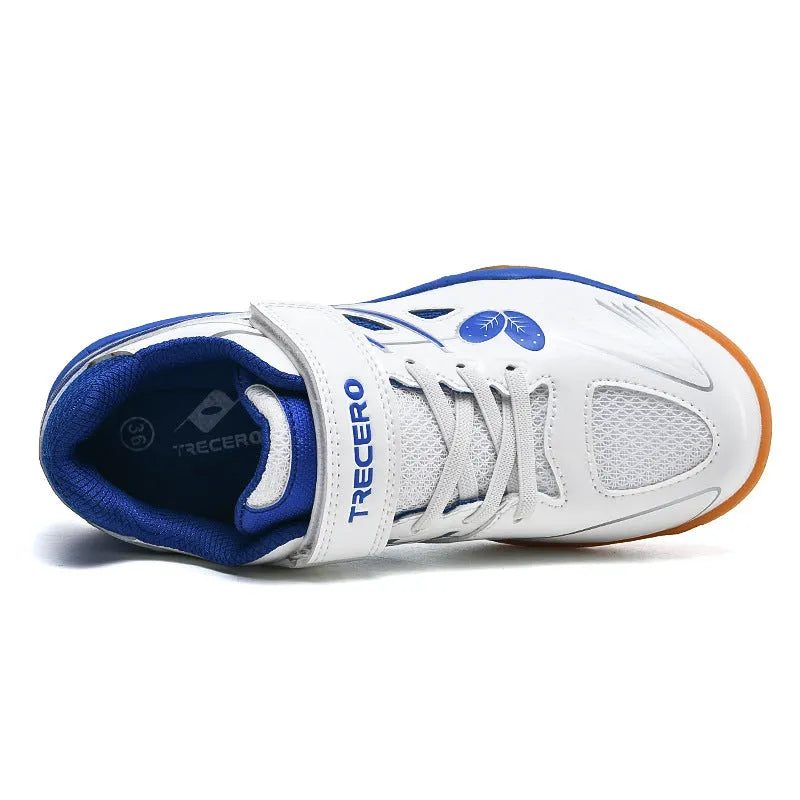 Breathable and non-slip badminton shoes in white and blue with ribbed outsole, low-top design, and hand-painted details.