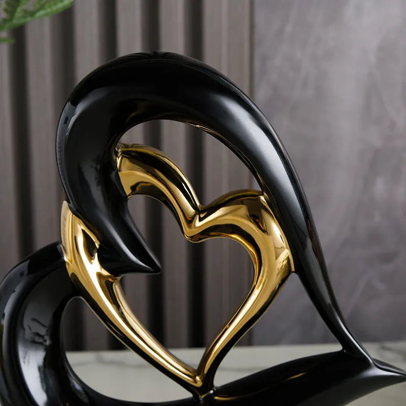 White porcelain love heart ornament with geometric design in metallic finish, approximately 19cm in size