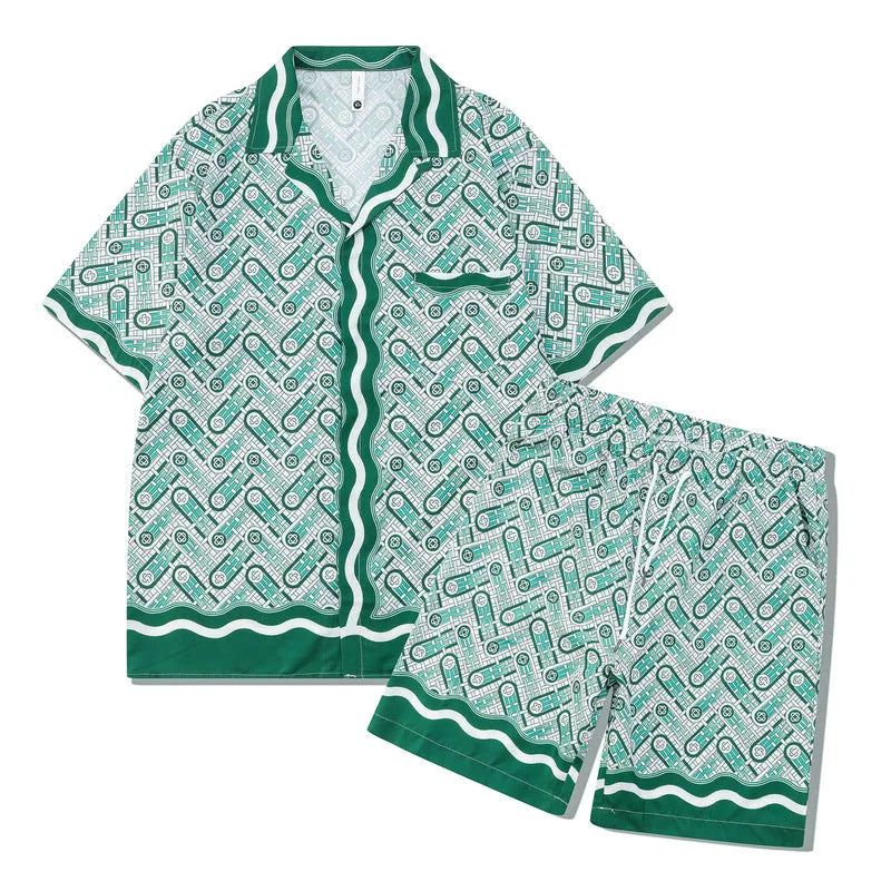 Plaid patterned short-sleeve shirt and matching trousers laid flat, a blue and white beachwear set.