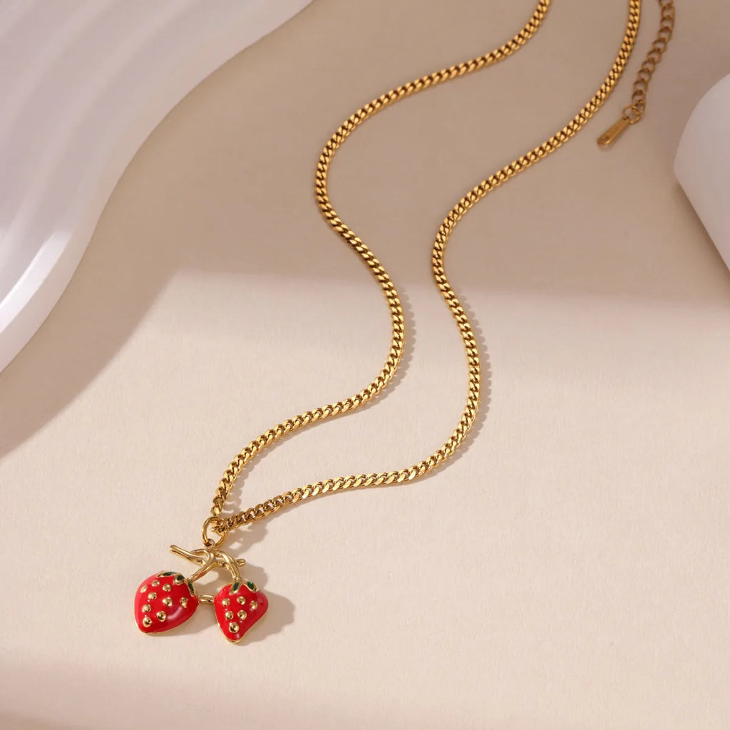 Stainless steel strawberry pendant necklace with 3cm charm in red or white powder gradient finish