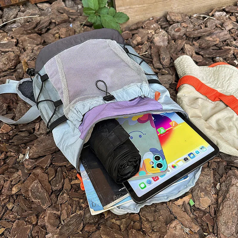Japanese-style casual backpack in nylon with waterproof function and contrasting fold details