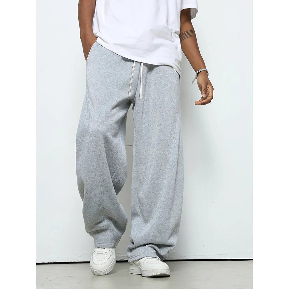 Men's straight leg casual trousers in polyester with micro-elastic waistband and drawstring closure, available in three colours.