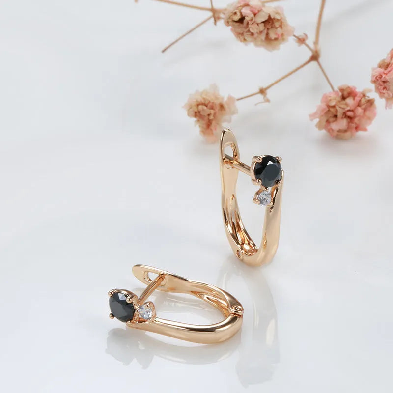 Gold geometric drop earrings with black agate stone inlay on copper setting, retro design