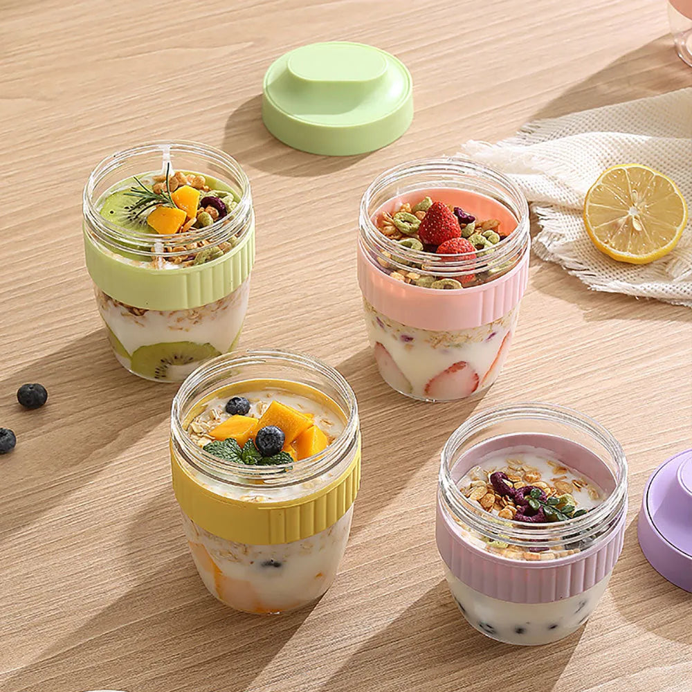 Green plastic salad cup with attached spoon lid showing 480ml capacity measurement