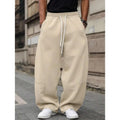 Men's straight high waist casual trousers in dark grey, showcasing cropped length and straight-leg silhouette.