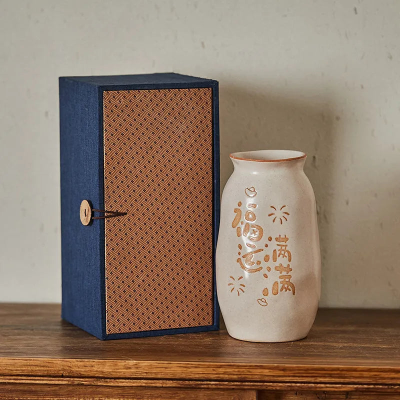 Chinese hand-painted ceramic joy vase with 8 cm diameter, showing traditional carving and lucky persimmon colour.