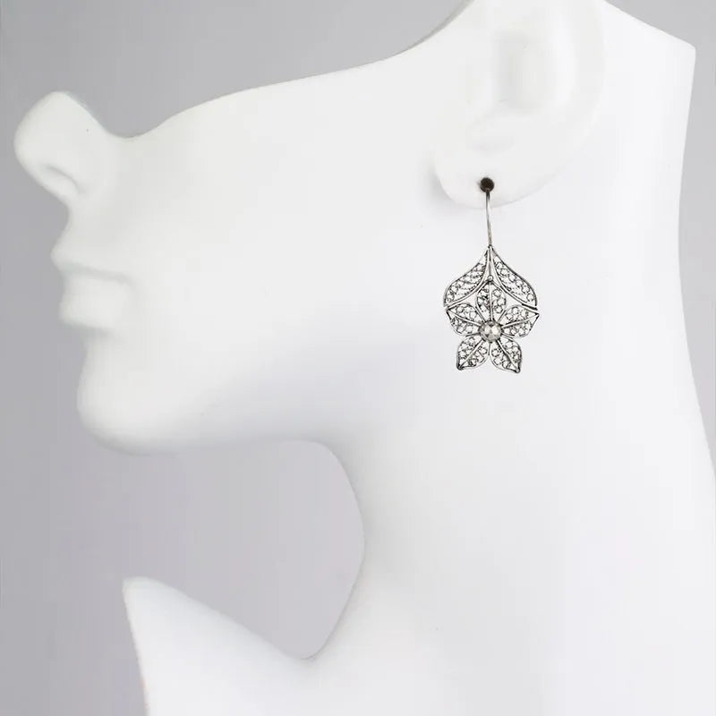 Silver retro hollow flower leaf-shaped alloy earrings for women with pierced fitting