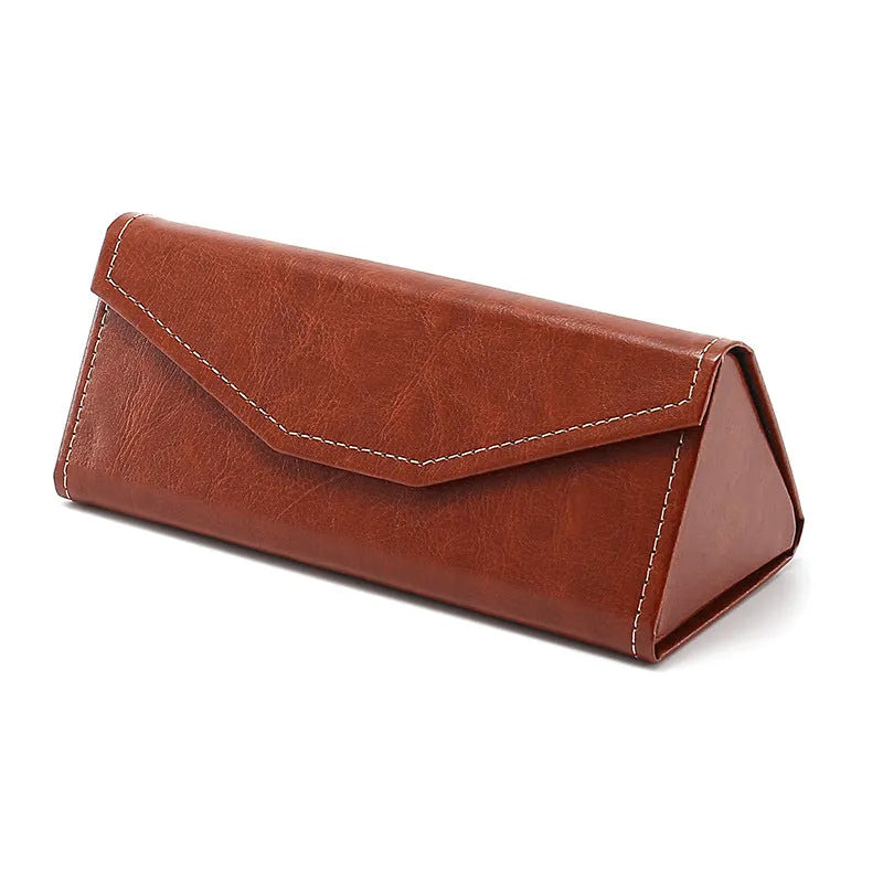 Handmade PU cowhide glasses case in triangle folding design with 160x66x16mm dimensions for full-rim frame protection.