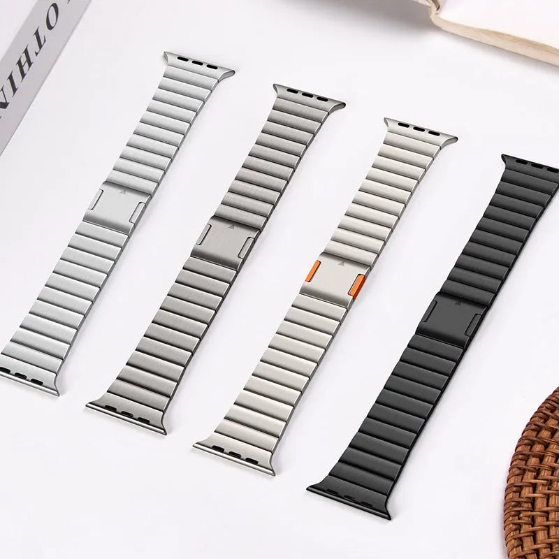 Fashion magnetic buckle steel watch strap in stainless steel, showing adjustable closure and business style for Apple Watches