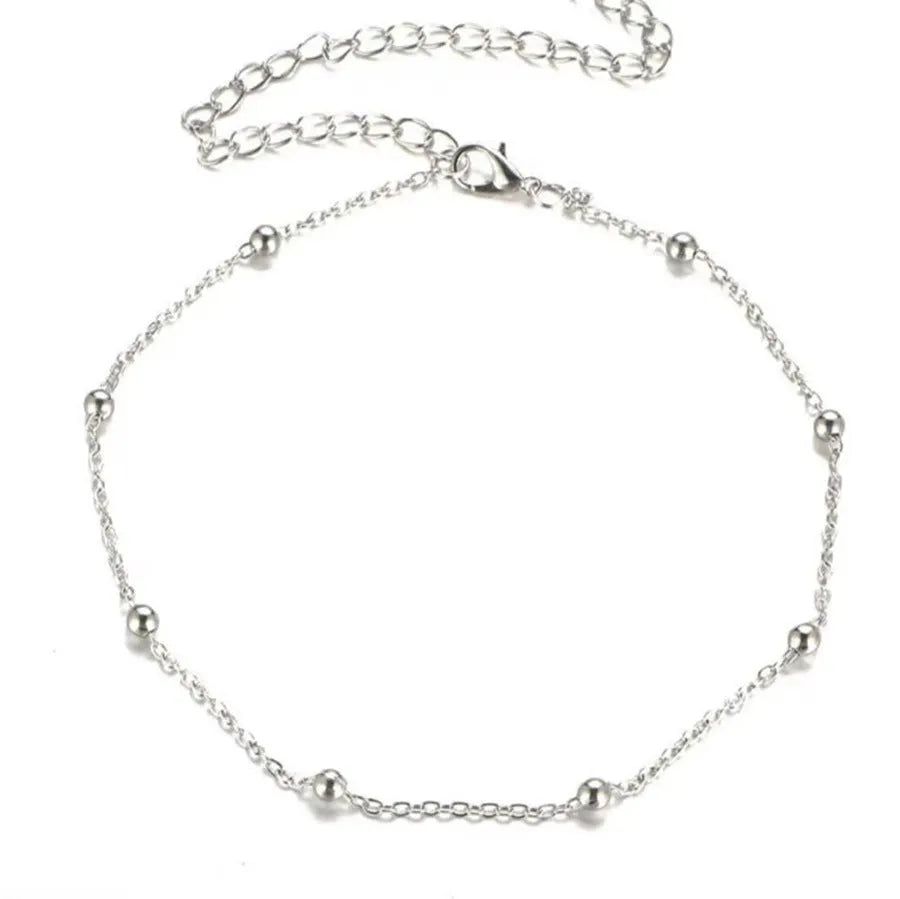 Women's bohemian anklet with geometric pendant on twisted chain in gold electroplated finish