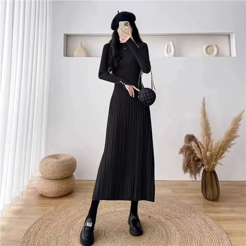 Women's beige knitted A-line dress with high waist and regular sleeves on a hanger.