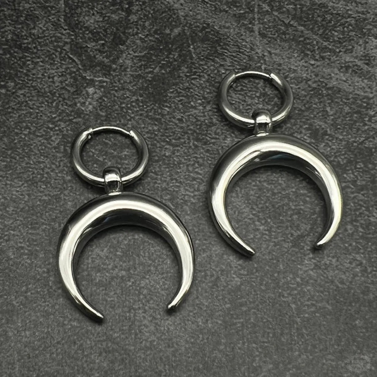 Silver geometric hoop earrings with moon detail, punk-style gothic design, ear clip fastening