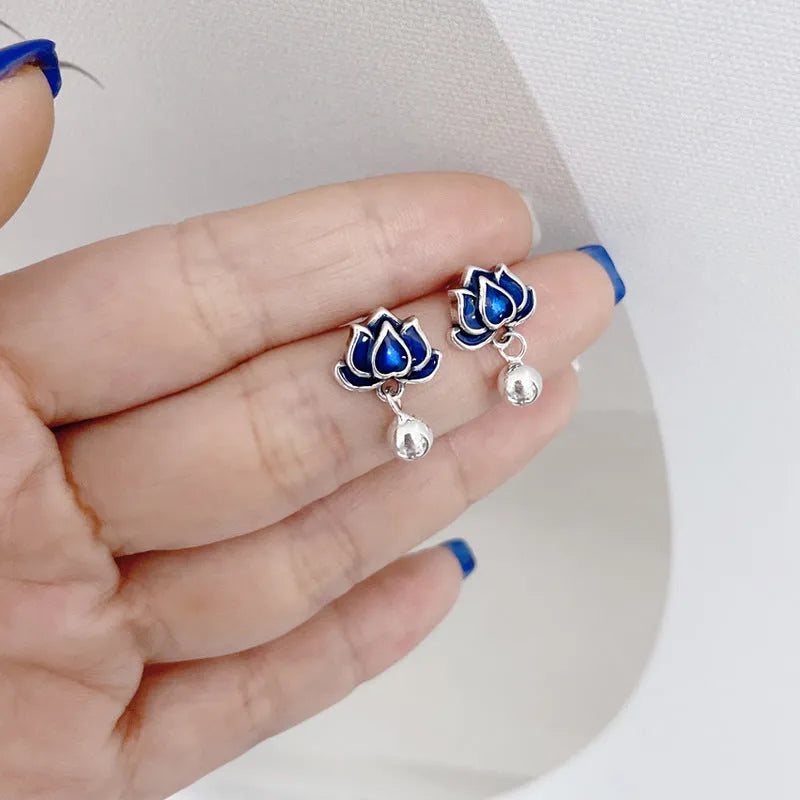Blue lotus earrings with retro artistic seedpod tassel design, 1.2cm wide alloy studs with silver needle fastening