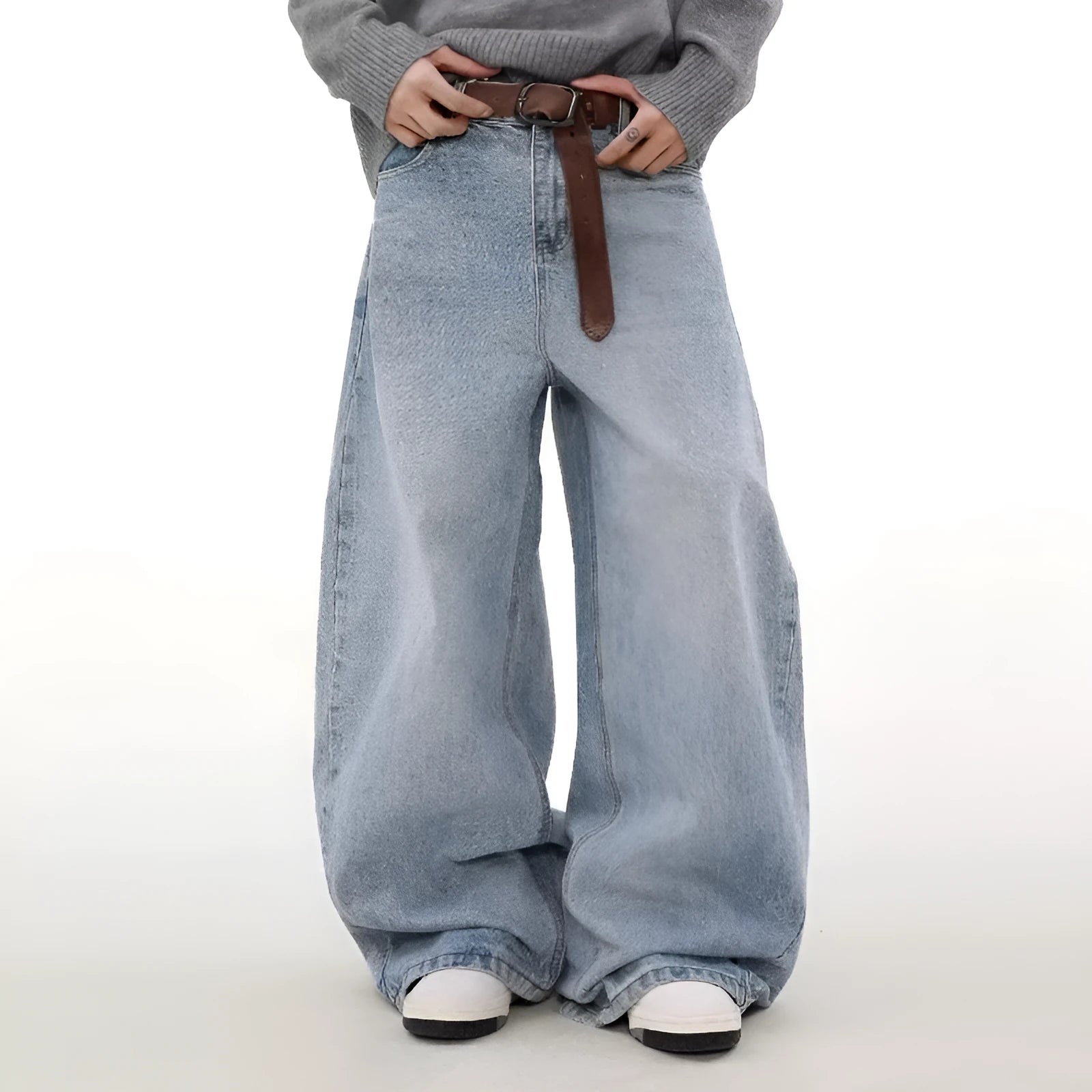 Men's blue straight leg jeans with a distressed retro wash and a mid-rise waist.