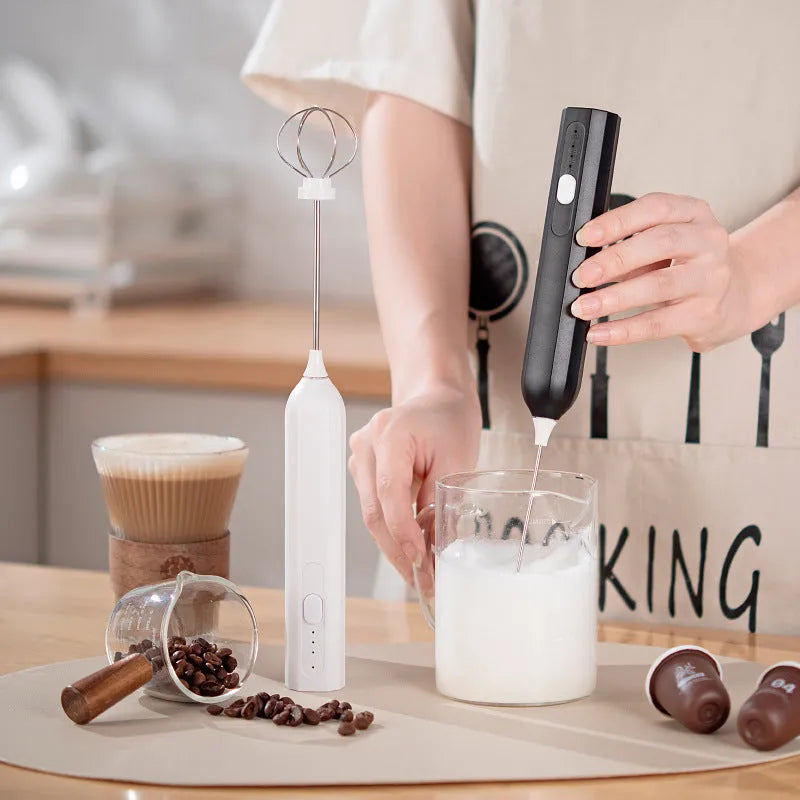 USB rechargeable handheld electric whisk in apricot colour with whisk attachment